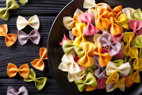 Italian Natural Colored Farfalle Pasta Close Up Black Table Stock