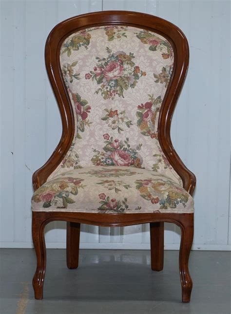 A wingback or high back armchair can create a great reading spot, with a strategically positioned floor lamp placed beside it. Lovely Victorian Walnut Framed with Floral Upholstery ...