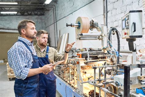 Workers Using Modern Machines At Stock Photos Motion Array