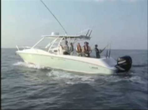 The standard deluxe leaning post with livewell, freshwater sink, three tackle boxes and bait prep station promote outstanding recreational fishing in any of your favorite saltwater or freshwater spots. Boston Whaler 320 Outrage Cuddy Cabin - YouTube