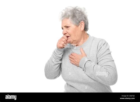 Portrait Of Coughing Elderly Woman On White Background Stock Photo Alamy