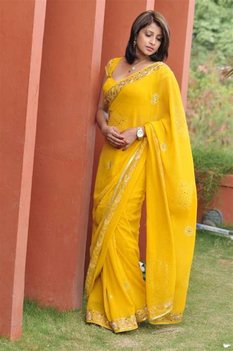 Actress Nadeesha Hemamali Sexy Cleavage And Backside Show In Yellow Saree Photoshoot Stills