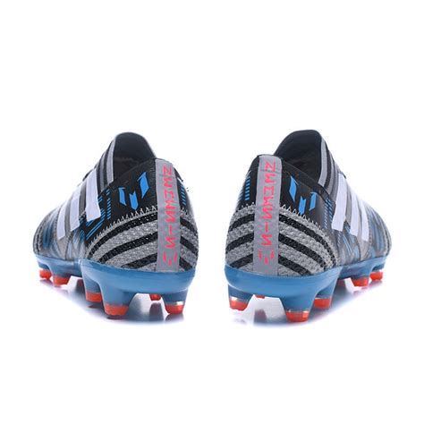 What football boots does lionel messi wear? adidas Men's Nemeziz Messi 17.1 FG Soccer Boots Blue White