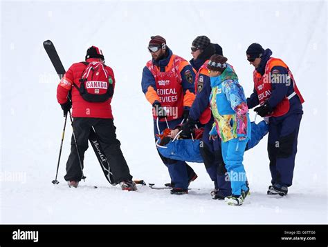 Canadas Yuki Tsubota Is Carried Off After Falling On Her Final Jump Of