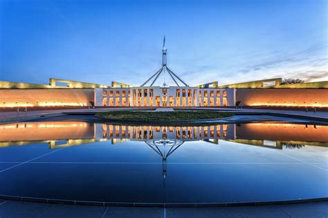 dramatic evening sky over parliament house illuminated at twilight which was the world s most