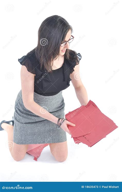 business woman kneeling picking up files stock image image of folders glasses 18635473