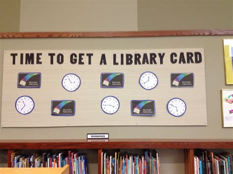 There Is A Sign That Says Time To Get A Library Card With Clocks On It
