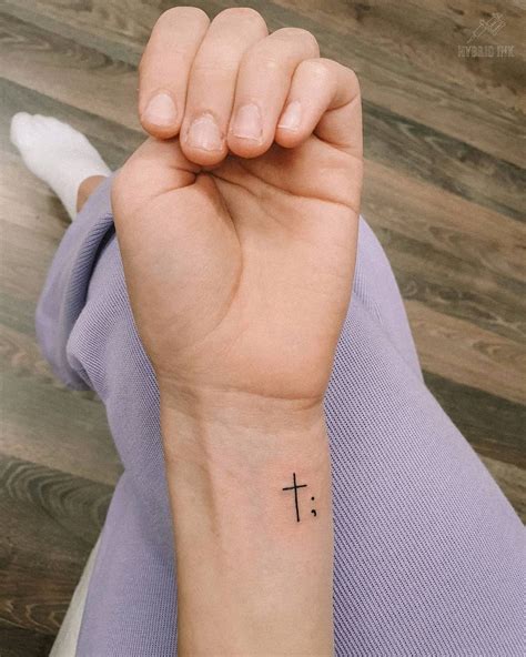 Cross Side Wrist Tattoo