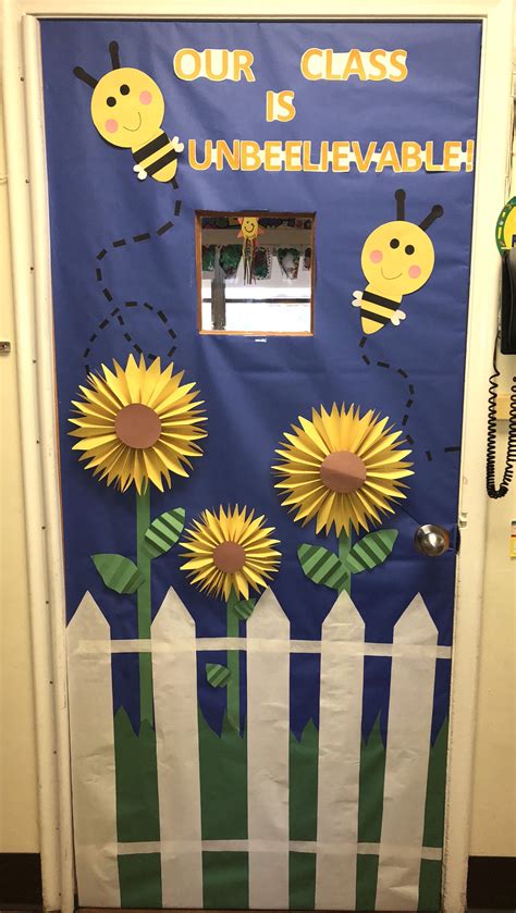 A Door Decorated With Sunflowers And The Words Our Class Is Unbelevable