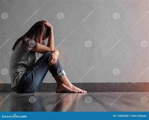 Sad Woman Hug Her Knee And Cry While Sitting Alone Stock Photo Image