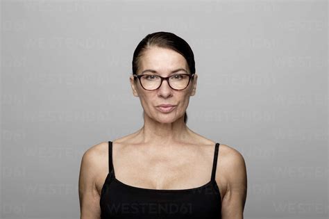 Portrait Of Serious Mature Woman Wearing Glasses