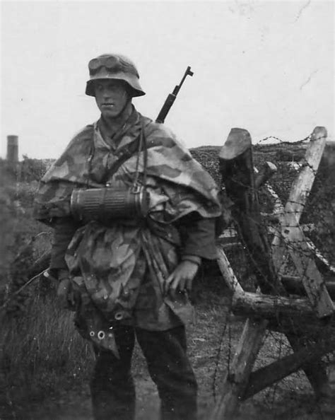 Wehrmacht Soldier With Zeltbahn Stahlhelm Gasmaskenbuchse World War