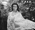 Kim Kardashian Shows Off Her Bare Baby Bump in DuJour Magazine