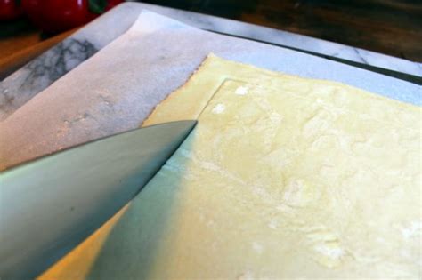 Top the puff pastry with grated cheese, followed by sauteed mushrooms. Puff Pastry Pesto Pizza