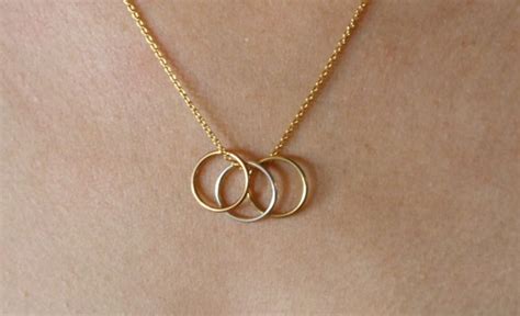 They are tokens of your infinite love for one another. my new necklace - Becca Garber