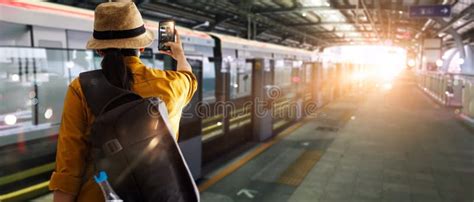 Transportation And Travel Traveler Women Are Take Photo Electric Train In Station While Waiting