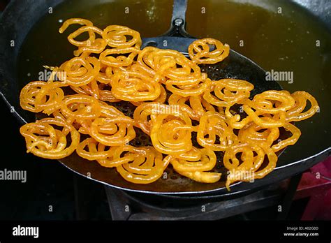 Indian Food Fried In Oil Sweet Dish Jalebi Dough Squeezed Through Cloth