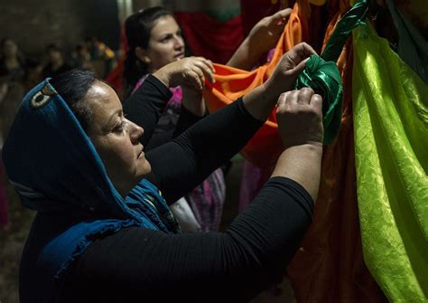 eric lafforgue yazidi women making knots inside the temple city of lalesh kurdistan iraq how