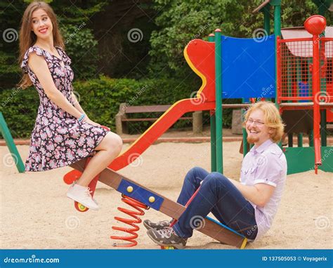 Funny Couple Playing On Playground Stock Image Image Of Adult Laugh 137505053