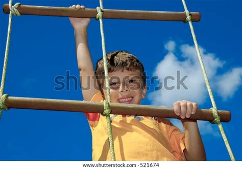 Young Boy Climbing Rope Ladder Stock Photo 521674 Shutterstock