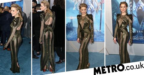 Amber Heard Continues To Slay On Aquaman Promo Tour In Sheer Gown