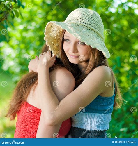 Two Beautiful Women Outdoors Embracing Stock Image Image Of Caucasian Friendly