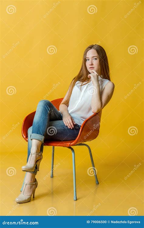 Young Beautiful Woman Sitting On Chair Stock Photo Image Of Pretty