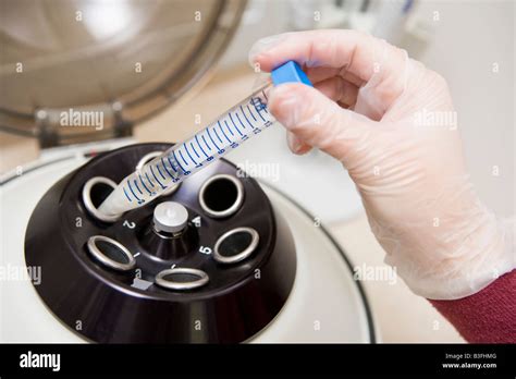 Embryologist Putting Sample Centrifuge Selective Hi Res Stock