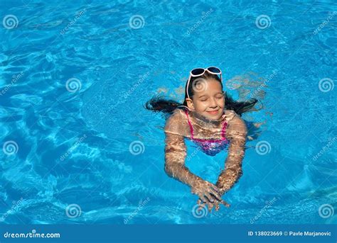 Real Adorable Girl Relaxing In Swimming Pool Stock Image Image Of Summer Playing 138023669