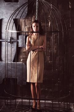 Woman In Cage