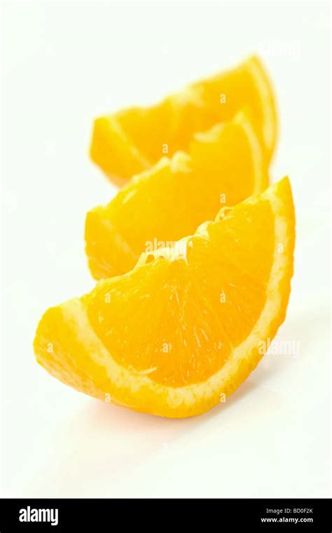 Fresh Orange Halves Isolated Against A White Background Stock Photo Alamy