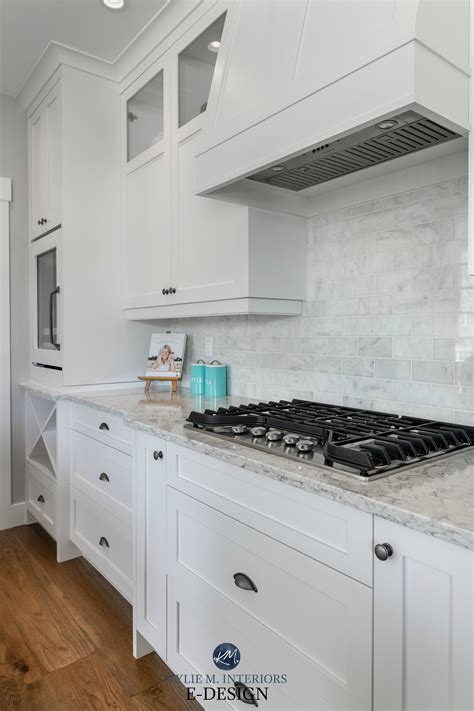 A monochromatic white palette from cabinetry to quartz countertops diy kitchen remodel ideas white kitchen with gray countertops, backsplashes with. White Kitchen Cabinets - 3 Palettes to Create a Balanced ...