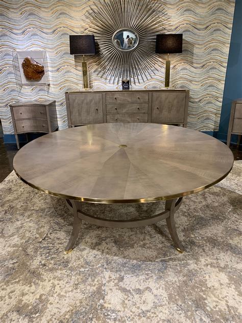 Choose between glass or wood round tables with chairs and enjoy free shipping on your order. Modern History Gray Sycamore 72" Round Dining Table with ...