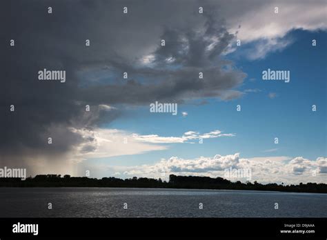 Summer Storm Over Lake Stock Photo Alamy