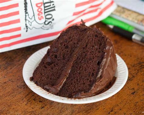 Absolutely incredible paleo chocolate cake made with almond flour and coconut flour and topped with a whipped paleo chocolate frosting. Portillo's Chocolate Cake Copycat - Cookie Madness