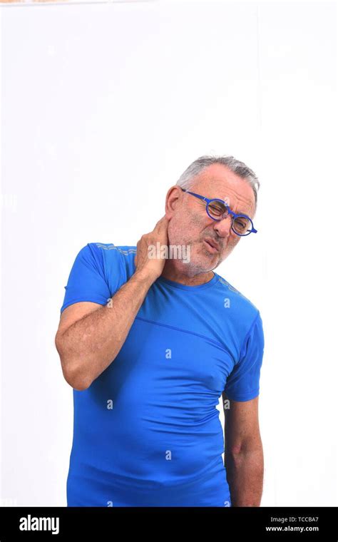 Man With Pain On Nape On White Background Stock Photo Alamy
