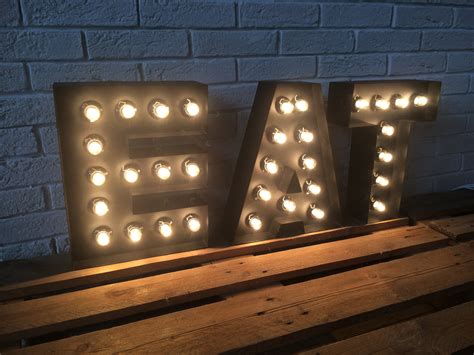 Large metal letters with lights that are perfectly designed to suit your advertising needs. Letters of metal LARGE EAT sign light up kitchen or restaurant