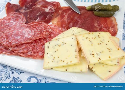 Raclette Cheese And Cold Cuts On A Table Stock Photo Image Of France