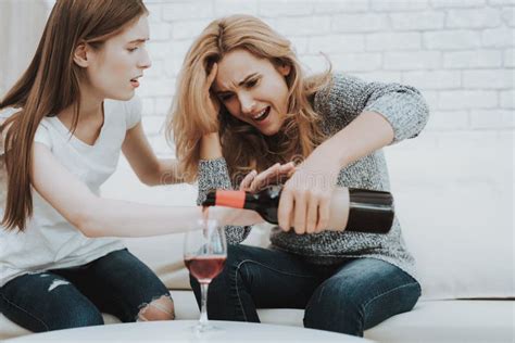 Upset Screaming Daughter With Drunk Mother At Home Stock Image Image