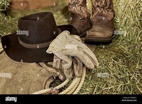 Western Cowboy Hat With Cowboy Boots Leather Gloves Leather Chaps And