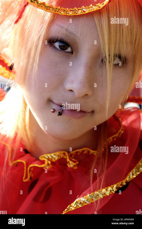 Portrait Of Funky Japanese Teen With Facial Piercing In Harajuku Stock