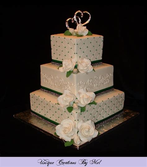 Perfect for flowers & fruit. 3-Tier square wedding cake with buttercream icing, white ...