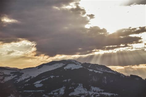 Sunrays Passing Through Clouds · Free Stock Photo