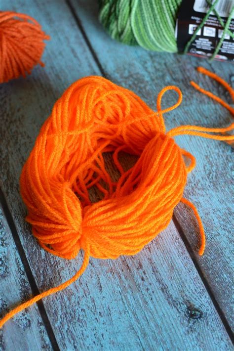 Easy Diy Yarn Pumpkins No Sew Pumpkin Garland Not Quite Susie