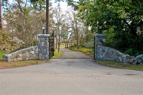 Stone And Iron Gates At Driveway Entrance Landscape Other By