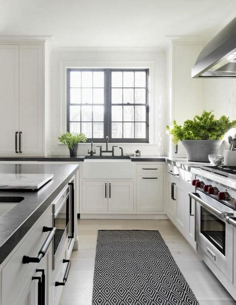 White cabinets lend themselves to a variety of design styles, and when it comes to countertops, the popular white kitchen cabinets gleam with pizzazz, do you agree? White kitchen black countertop: ideas and inspiration for ...