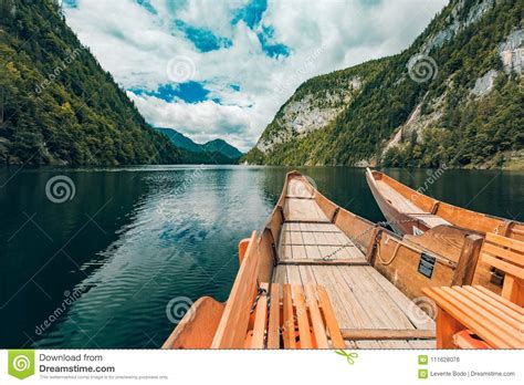 Wooden Boat On Mountain Lake Nature In The Mountains Stock Photo