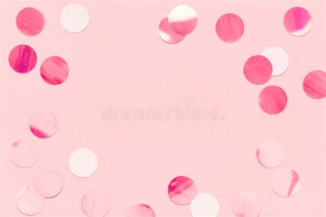 Festive Frame Of Confetti On Pink Pastel Trendy Background Stock Photo