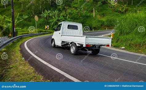 White Daihatsu Gran Max Pick Up Truck On The Curved Road Editorial