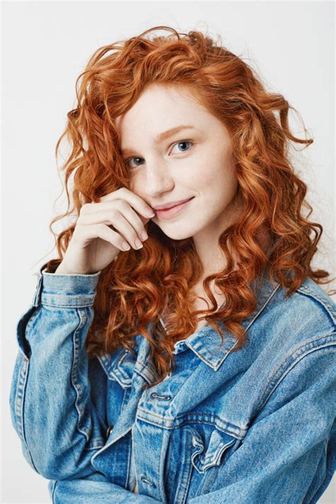 The way you style your hair is also important. Portrait of cute young girl with red curly hair and ...
